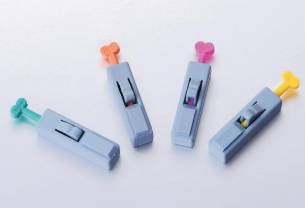 Button Activated Safety Lancets